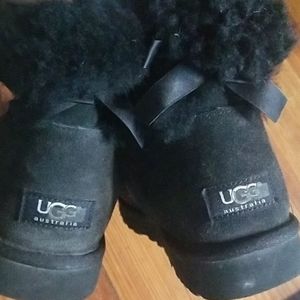 Black short uggs with bow detail